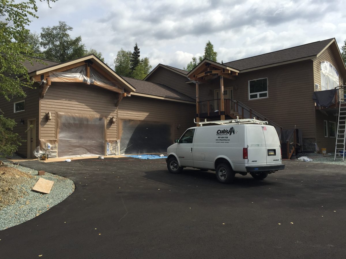 The Cub's Painting Services van on a job site